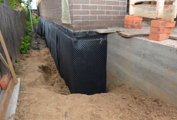 Happy homeowners after waterproofing job in Turin